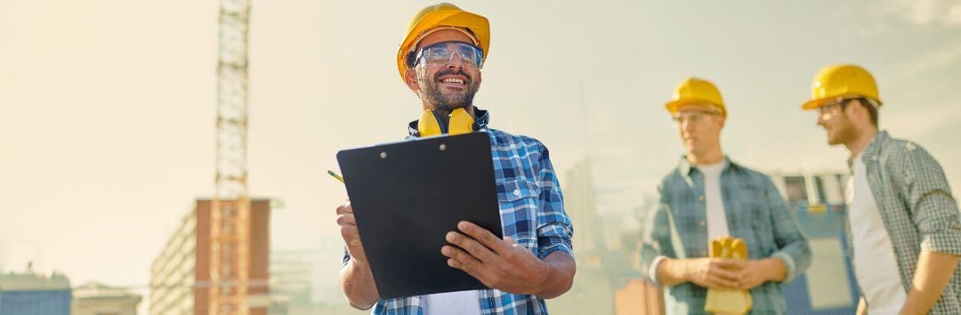 Construction worker with clip board