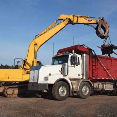 hauling debris off site via truck for heavy construction