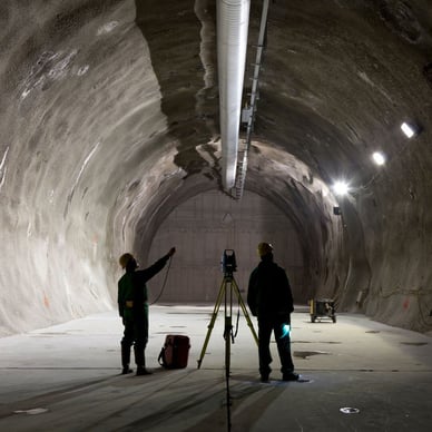 workers surveying underground pipes for new job